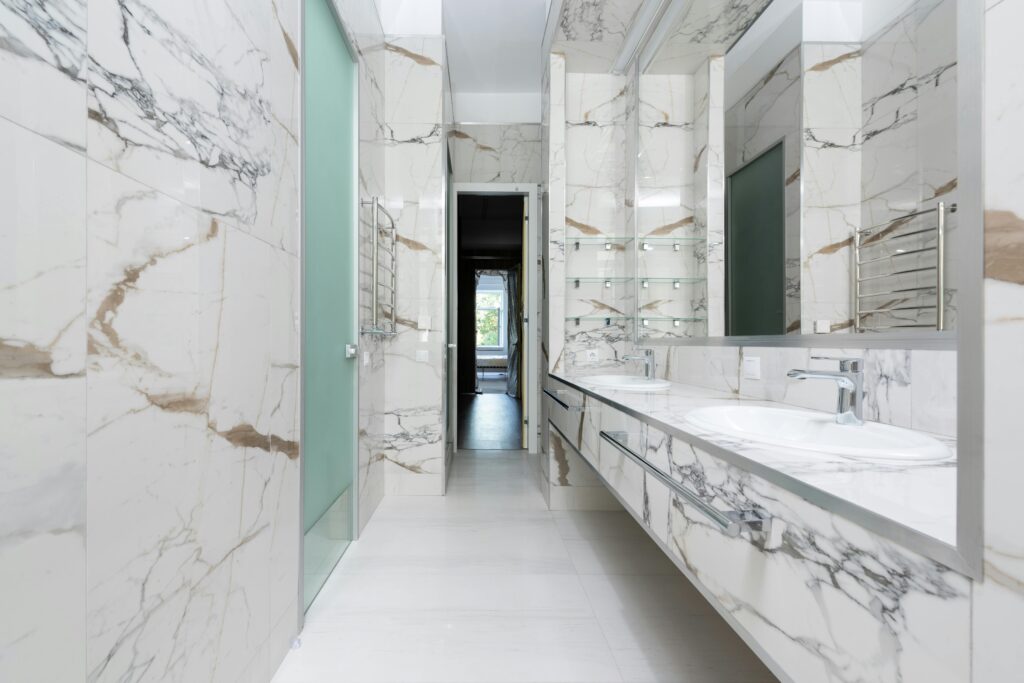 A traditional-style bathroom with vintage-inspired vanity and fixtures